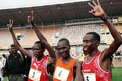 left to right: Francis Kibiwott (Ken), Solomon Busendich (Ken), Dieudonn Disi (RWA) 
after the end of the 2006 Lagos Half Marathon (Louisette Thobi)