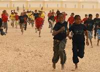 Children running in the AIMS Children's Series 2008 at the Sahara Marathon in the Smara refugee camp in the far west of Algeria