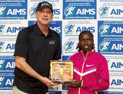 Florence Kiplagat presented with AIMS World Record Award