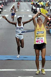 Maria Zeferina Baldaia (3rd) celebrates as Marildo Jose Barduco (5th) rejoices