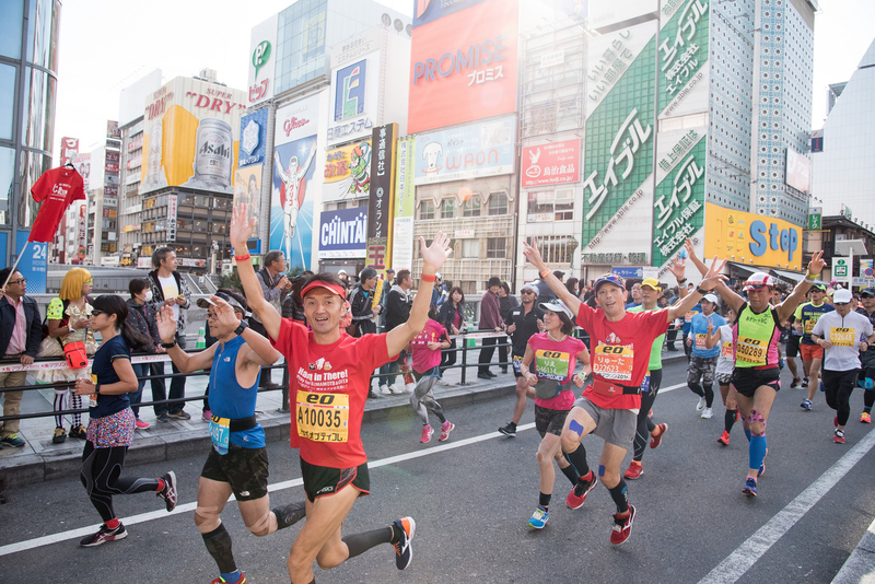 3. running on midosuji while looking a sign of glico.